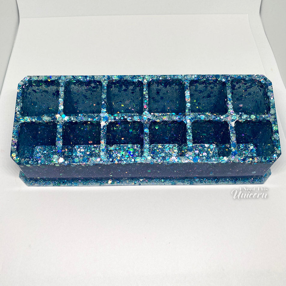 Glittery blue resin lipstick organizer with 12 slots