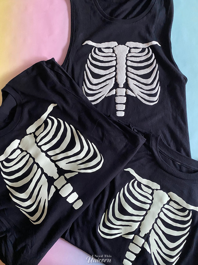 Glow in the dark skeleton ribcage vinyl on black t shirt