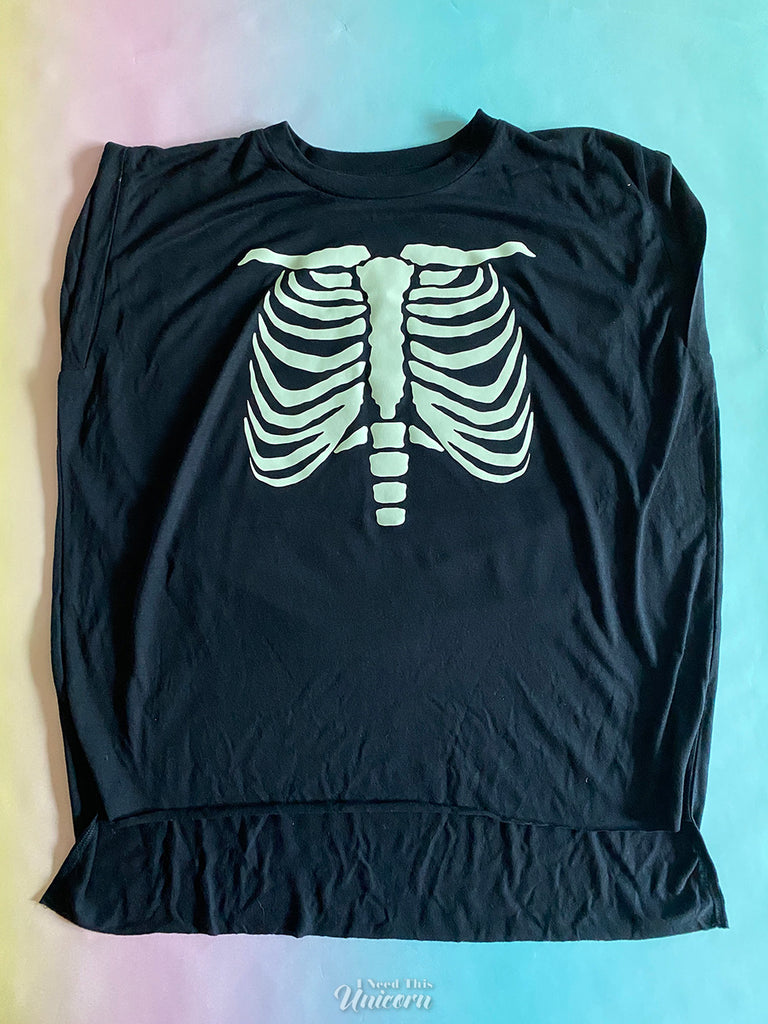 Glow in the dark skeleton ribcage vinyl on black t shirt