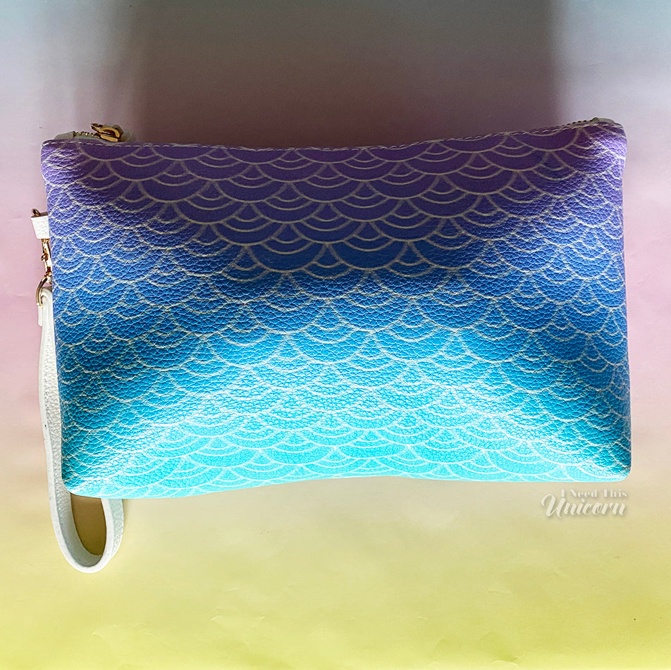 Sea Siren purple to blue mermaid scale print vegan leather cosmetic bag with white tassel and zipper closure