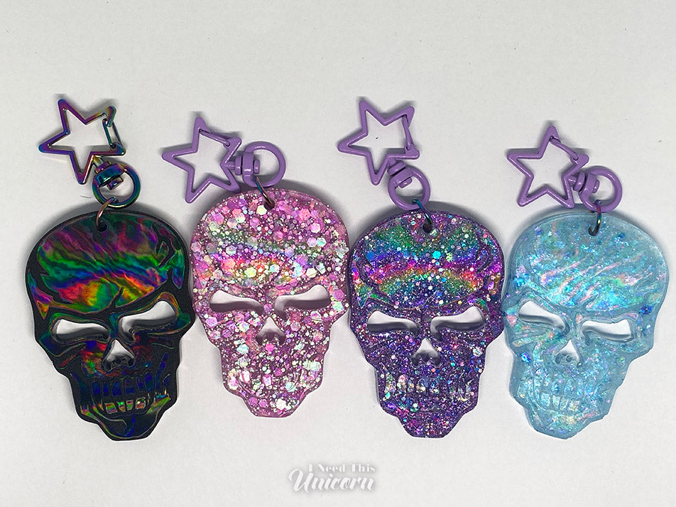 4 holographic skull key chains