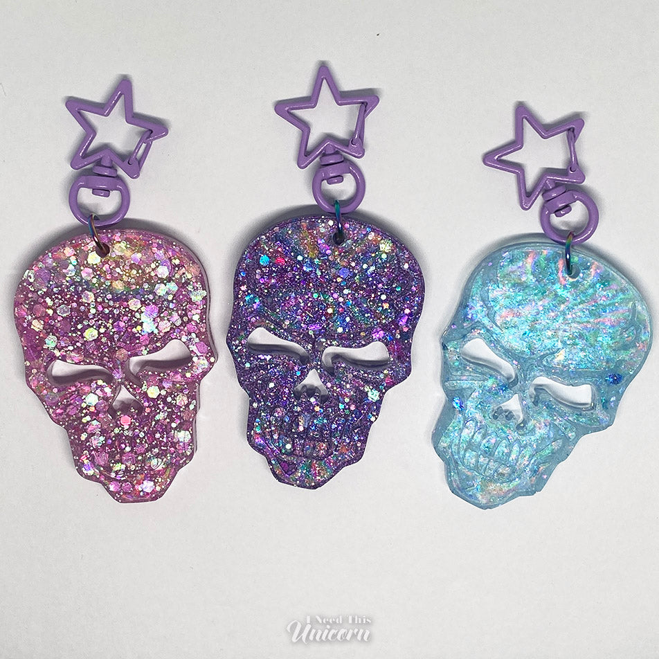 Holographic skulls with holo glitter in pink, purple and light blue